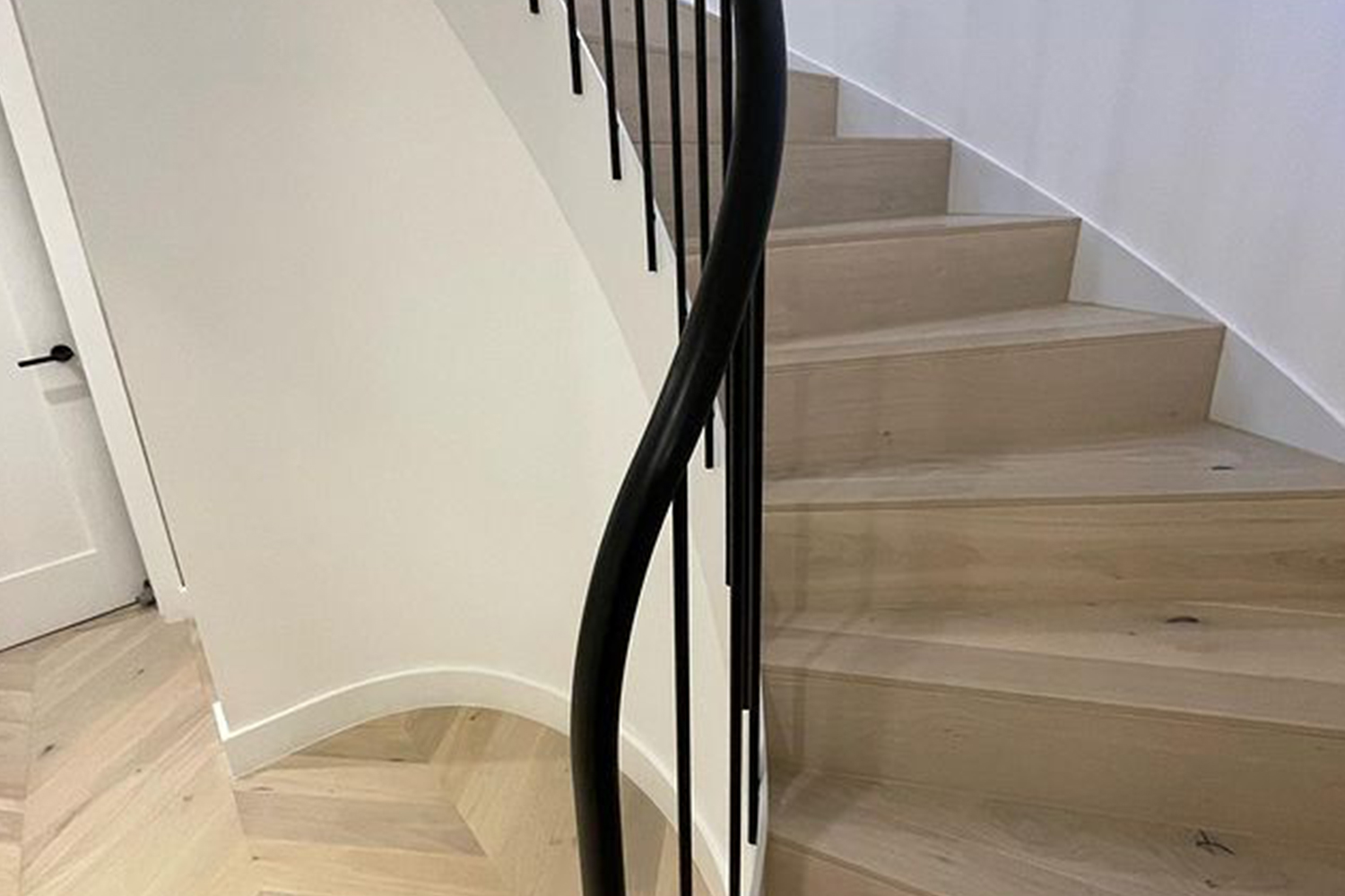 A staircase black railings after finishing